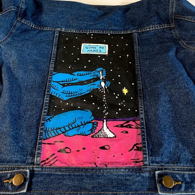 Denim jacket with Watchmen comic painted on it